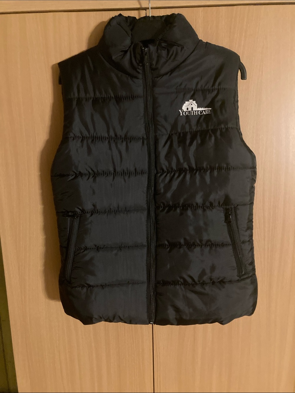 Black Puffer Vest with Youth Care Logo